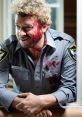 Bloody law enforcement character smiling, showcasing a humorous yet intense moment related to the Pineapple Express theme.