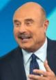 Dr. Phil enthusiastically discussing a topic, wearing a suit against a blue background, showcasing his engaging personality.