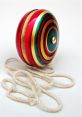 Yoyo The of a yoyo being played is a rhythmic and soothing "Linging" as it twirls up and down on its string. The gentle