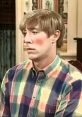 Stuart from MadTV with plaid shirt, known for his awkward humor and unique character style. Iconic sketch comedy moment.