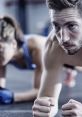 Focused individuals engaging in intense plank exercises in a fitness environment, emphasizing dedication to health and wellness.