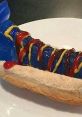 Whimsical hot dog styled as a foot, topped with ketchup and mustard, combining humor with fast food culture.