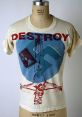 Vintage t-shirt featuring bold "DESTROY" graphic and artistic design, combining imagery and iconic style elements.