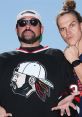 Kevin Smith and Jason Mewes pose together, showcasing their iconic styles linked to "Jay & Silent Bob Strike Back.