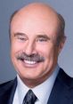 Dr. Phil smiling in a suit, known for his engaging persona and featured in prank call skits. Enjoy laughs and insights!