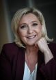 Marine Le Pen The of chanting fills the air, as a crowd of supporters shout "Marine! Marine!" in unison. Their voices are