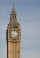 Iconic view of Big Ben against a blue sky, showcasing its intricate clock design and Gothic architecture.