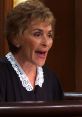 Judge Judy expressing surprise during a courtroom scene, embodying her iconic and engaging persona in "Prank Call: Judge Judy.