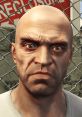 Close-up of Trevor from GTA, showcasing his intense expression against a background of metal fencing and warning signs.