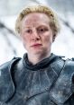 Brienne of Tarth in armor, showcasing her fierce determination and complex emotions from Game of Thrones.