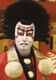 Kabuki performer in traditional attire, showcasing elaborate makeup and dramatic hairstyle, embodying rich cultural heritage.