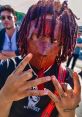 Trippie Red Trippie Redd's is anything but quiet. The vibrant that emanate from his songs are a mix of hard-hitting beats,