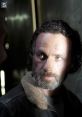 Rick Grimes with intense expression, featuring a rugged look and dramatic lighting, embodying survival in a post-apocalyptic world.