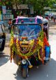 Tuk Tuk The cacophony of fills the air, a chaotic symphony of Tuk Tuk calls echoing through the bustling streets. "Tukabel,