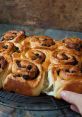 Buns "BUNS" - The word BUNS conjures up delicious images of freshly baked bread, warm and fluffy straight out of the oven.