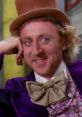 Willy Wonka smiles playfully, showcasing his iconic purple coat and bow tie, evoking childhood magic and whimsy.