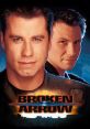 John Travolta and Christian Slater featured in the action-packed thriller "Broken Arrow," showcasing military tension and betrayal.