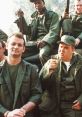 Bill Murray and cast in military uniforms, capturing the humor and camaraderie from "Stripes" movie.