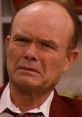 Red Forman making a frustrated expression, showcasing his iconic character from "That 70's Show - The Best of Red Forman.