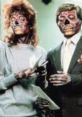 Characters from "They Live" revealing their true alien forms with skeletal faces, showcasing horror and social commentary themes.