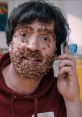 Herbert Clunkerdunk character with cereal-covered face, talking on the phone, showcasing quirky humor and creativity.