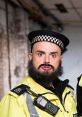 Bearded police officer in uniform with a surprised expression, showcasing community policing in Burnistown.