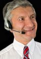 Smiling man in a headset promoting Caribbean Cruise Line Larry 2.0, highlighting customer service and engagement.