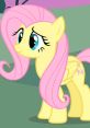 Fluttershy, the gentle yellow pony with pink hair, showcases her kind expression and vibrant personality in nature.