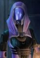 Tali'Zorah nar Rayya from Mass Effect 2, showcasing her iconic purple and black armor and mysterious demeanor.