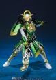 Kamen Rider figure in striking green and gold armor wielding a blaster, featuring intricate details and dynamic pose.