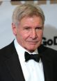 Harrison Ford in a tuxedo with a bow tie, showcasing his timeless style at a formal event. Iconic actor known for classic roles.