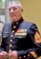 Lee Ermey in military uniform, displaying medals, showcasing his distinguished service and dedication as a Marine.