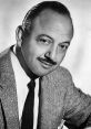 Mel Blanc, iconic voice actor known as the "Man of a Thousand Voices," in a classic black-and-white portrait.