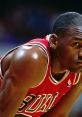 Michael Jordan in a red Chicago Bulls jersey, showcasing focus and determination on the basketball court during a game.