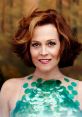 Sigourney Weaver shines in a glamorous green sequined outfit, showcasing her timeless elegance and charm.