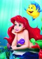 Ariel from The Little Mermaid daydreams underwater with Flounder, surrounded by colorful ocean life and coral.