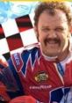 Cal Naughton Jr. in a red racing suit, smiling confidently with a checkered background, showcasing his NASCAR spirit.