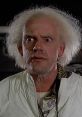 Emmett Doc Brown with wild hair, wearing a lab coat, expressing excitement about time travel in a classic sci-fi setting.