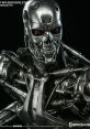 Detailed T-800 Endoskeleton maquette showcasing metallic structure and red eyes, perfect for Terminator fans and collectors.