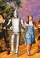 Dorothy, Scarecrow, Tin Man, and Cowardly Lion journey together along the Yellow Brick Road in "The Wizard of Oz.