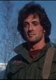 Heroic portrayal of Rambo from "First Blood," showcasing his rugged determination in a military setting.