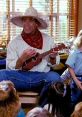 Arnold Schwarzenegger plays a fun teacher, strumming a ukulele for captivated kindergarten kids in "Kindergarten Cop.