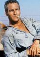 Paul Newman as Luke from "Cool Hand Luke," exuding confidence with a cigarette, capturing the film's rebellious spirit.