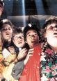 Young adventurers from "The Goonies" express awe in a dramatic scene, highlighting friendship and excitement.