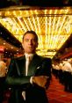 Robert De Niro as Sam "Ace" Rothstein in Casino (1995), exuding confidence in a vibrant Las Vegas casino setting.