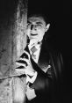 Bela Lugosi as Dracula in classic 1931 horror film, conveying a sinister presence with dramatic lighting and shadow.