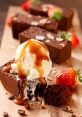 Decadent chocolate cake topped with ice cream, caramel sauce, and fresh strawberries, perfect for dessert lovers.