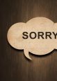 Stylized speech bubble with 'SORRY' text, conveying an apology on a textured wood background, perfect for conveying remorse.