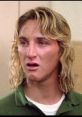 Jeff Spicoli from Fast Times at Ridgemont High displaying a confused expression, featuring his signature long, tousled hair.