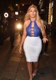 Chloe Ferry steps out in a striking blue bodysuit and white dress, showcasing her glamorous style in Geordie Shore nightlife.